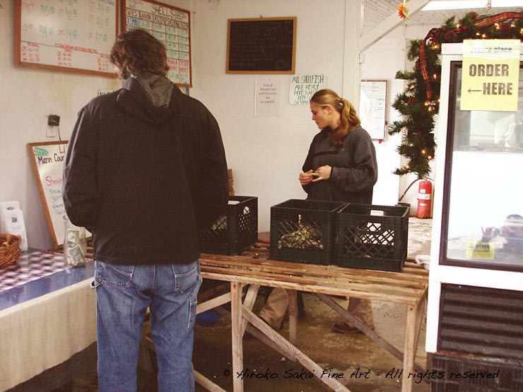a man buying oyster at the counter, Drakes bay oyster farm