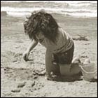 beach, girl playing with sand, sand castle, ocean beach, memory of summer